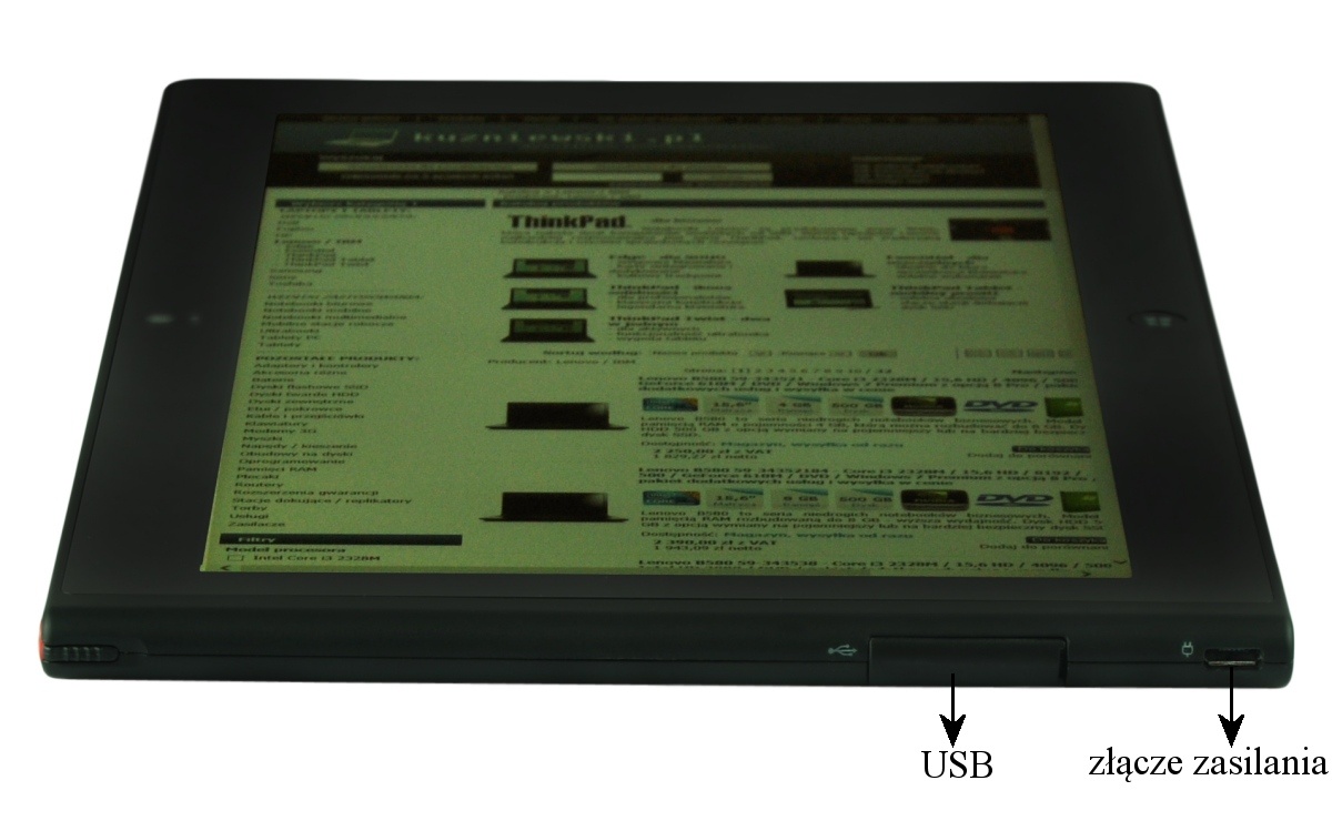 Black tablet displaying a webpage; arrows point to USB port and power connector on the bottom edge (labels in Polish).