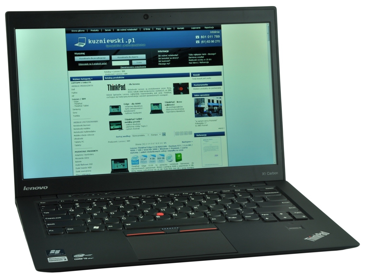 lenovo-thinkpad-x1-carbo_118384 - lab-kuzniewski.pl - Testy laptopów, recenzje i porównania Lenovo ThinkPad laptop open to a Polish website kuzniewski.pl on screen, with keyboard visible