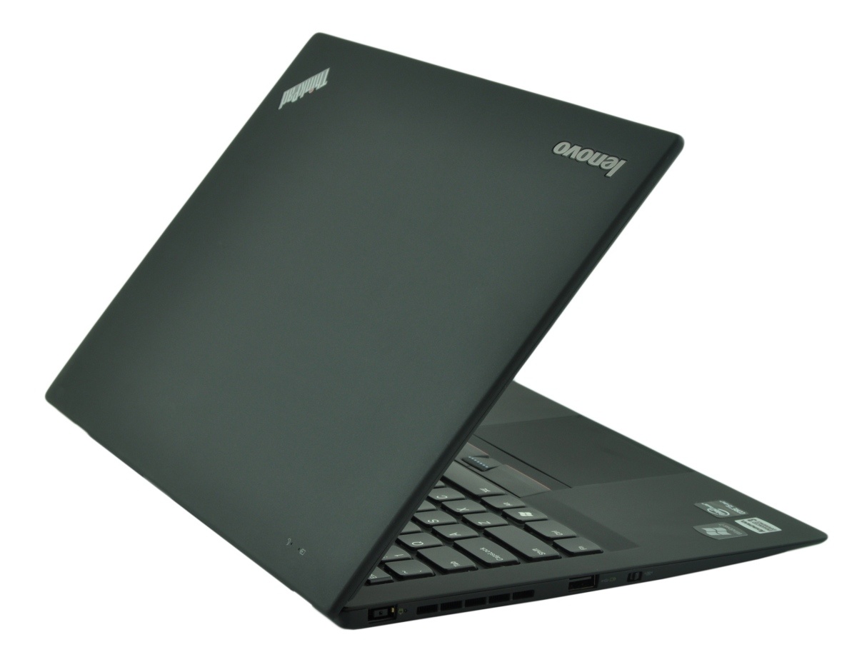 lenovo-thinkpad-x1-carbo_118385 - lab-kuzniewski.pl - Testy laptopów, recenzje i porównania Black Lenovo ThinkPad laptop, partially open on a white background, showing the ThinkPad logo on the lid and keyboard edge