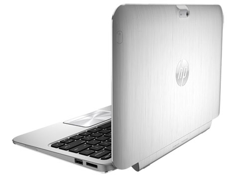 Silver HP laptop with the lid partially open, showing the keyboard and side ports.