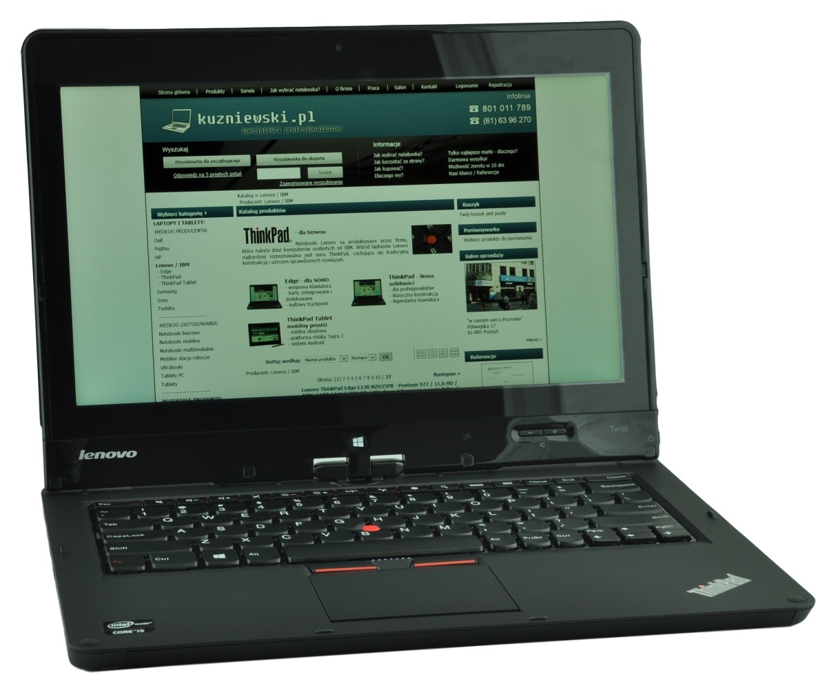 Lenovo ThinkPad laptop open, displaying a website on the screen.