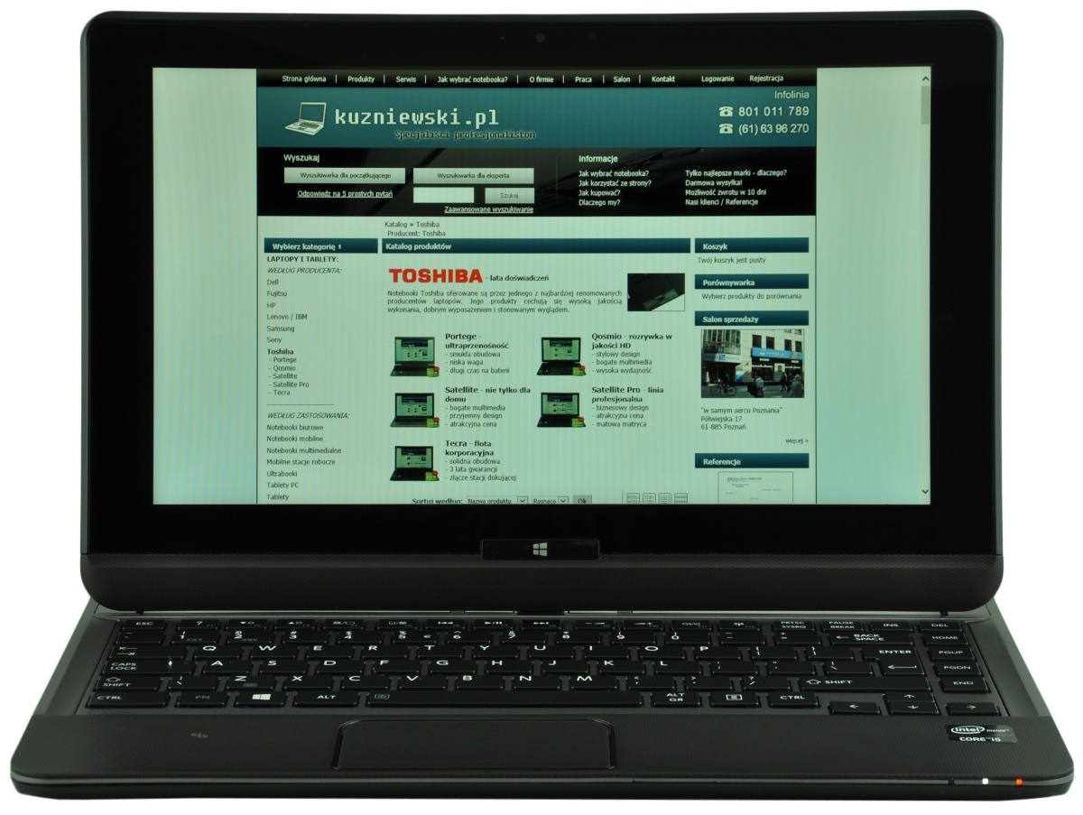 Laptop displaying kuzniowski.pl with Toshiba product listings and categories on the screen as a web page