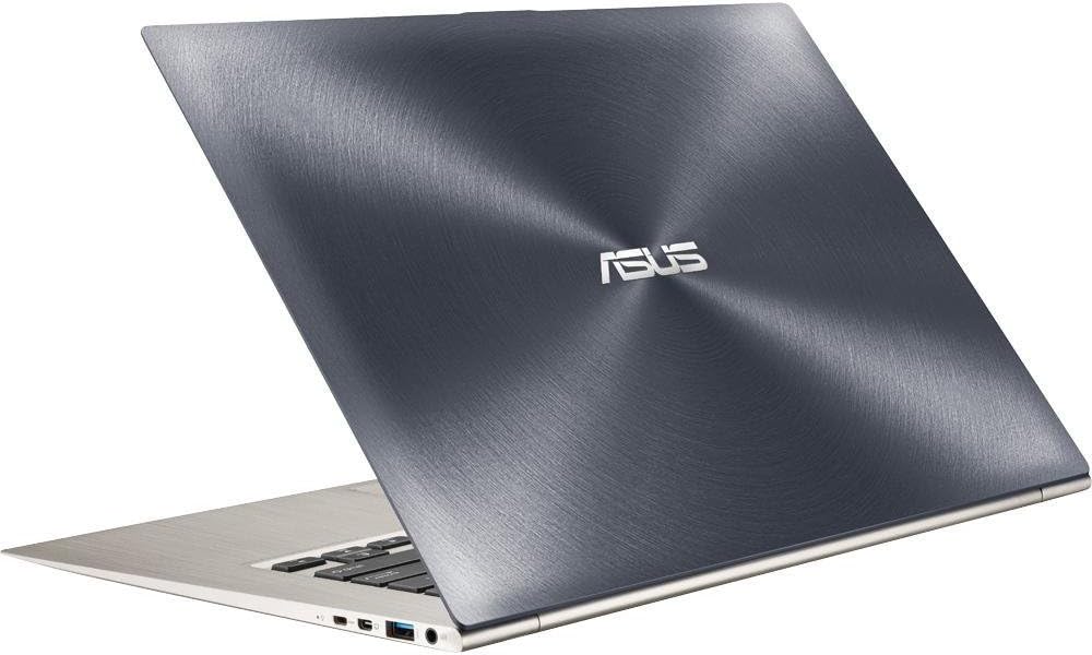 Brushed blue ASUS laptop open at an angle, showing keyboard and side ports