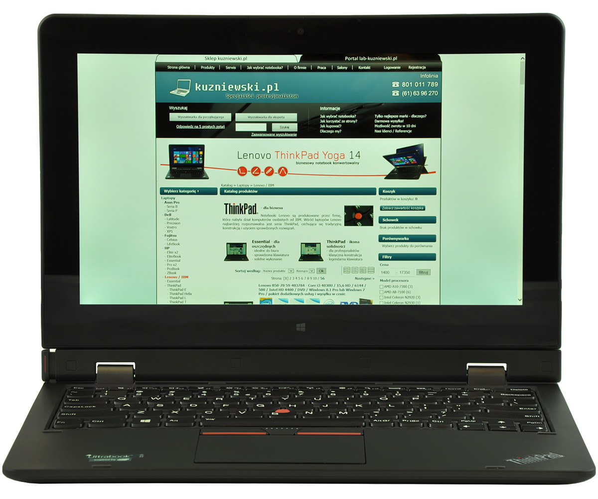 Open black laptop displaying a web page with a Lenovo ThinkPad Yoga 14 banner on the screen.