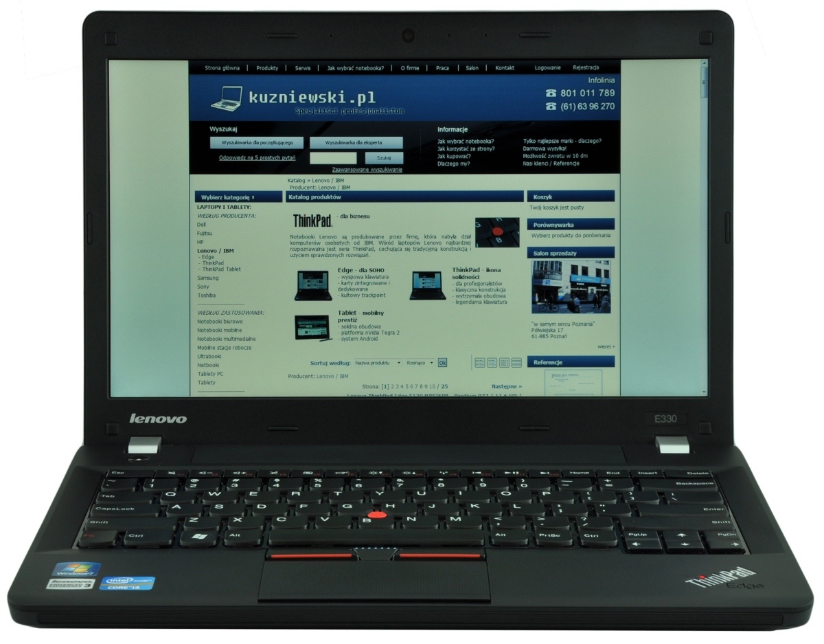 lenovo-thinkpad-edge-e33_118088 - lab-kuzniewski.pl - Testy laptopów, recenzje i porównania Lenovo ThinkPad laptop open, screen displaying kuzniiewski.pl homepage with a blue header.
