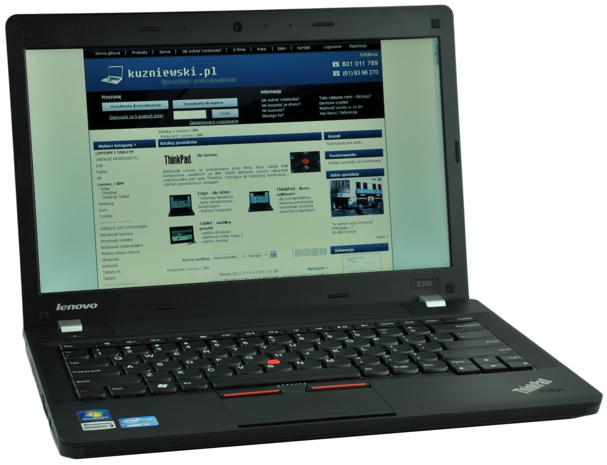 lenovo-thinkpad-edge-e33_118090 - lab-kuzniewski.pl - Testy laptopów, recenzje i porównania Lenovo ThinkPad laptop open, screen shows a blue website; keyboard and TrackPoint in foreground.