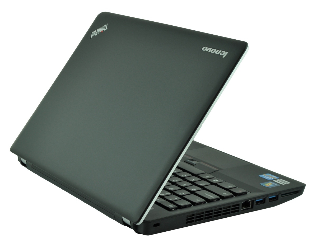 lenovo-thinkpad-edge-e33_118091 - lab-kuzniewski.pl - Testy laptopów, recenzje i porównania Black Lenovo ThinkPad laptop, partially opened to reveal the keyboard and side ports in a matte finish.