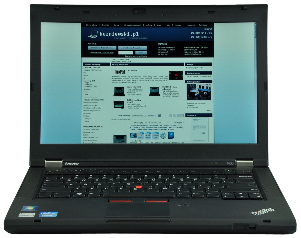 Black Lenovo ThinkPad laptop open with a website displayed on the screen, blue and white layout visible on the display panel.