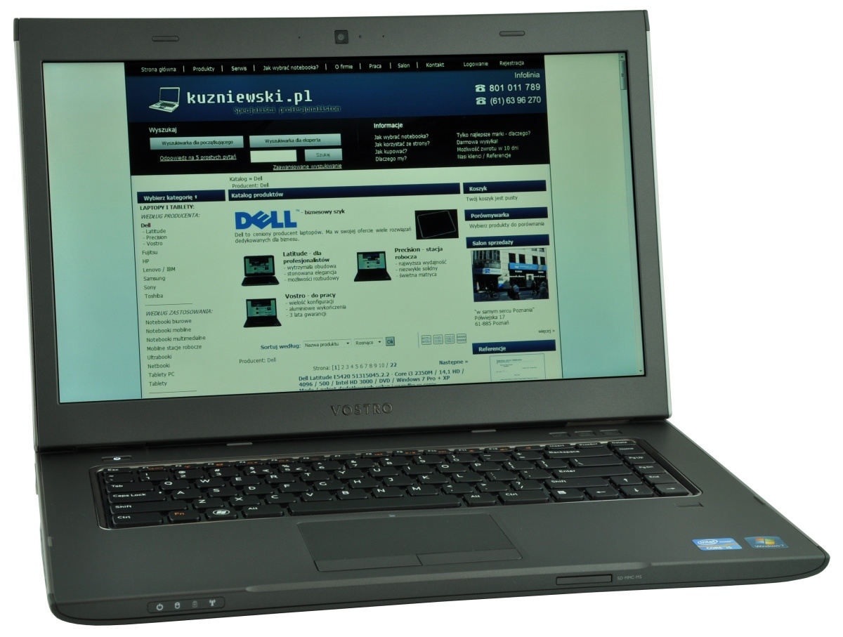 dell-vostro-3560-5160973_122375 - lab-kuzniewski.pl - Testy laptopów, recenzje i porównania Open laptop displaying a Polish electronics site kuzniewski.pl on the screen, with a black Vostro laptop body in view.
