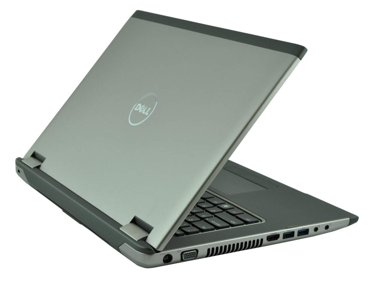 dell-vostro-3560-5160973_122376 - lab-kuzniewski.pl - Testy laptopów, recenzje i porównania Dell laptop in tent mode with screen angled back, showing side ports and keyboard (gray chassis).