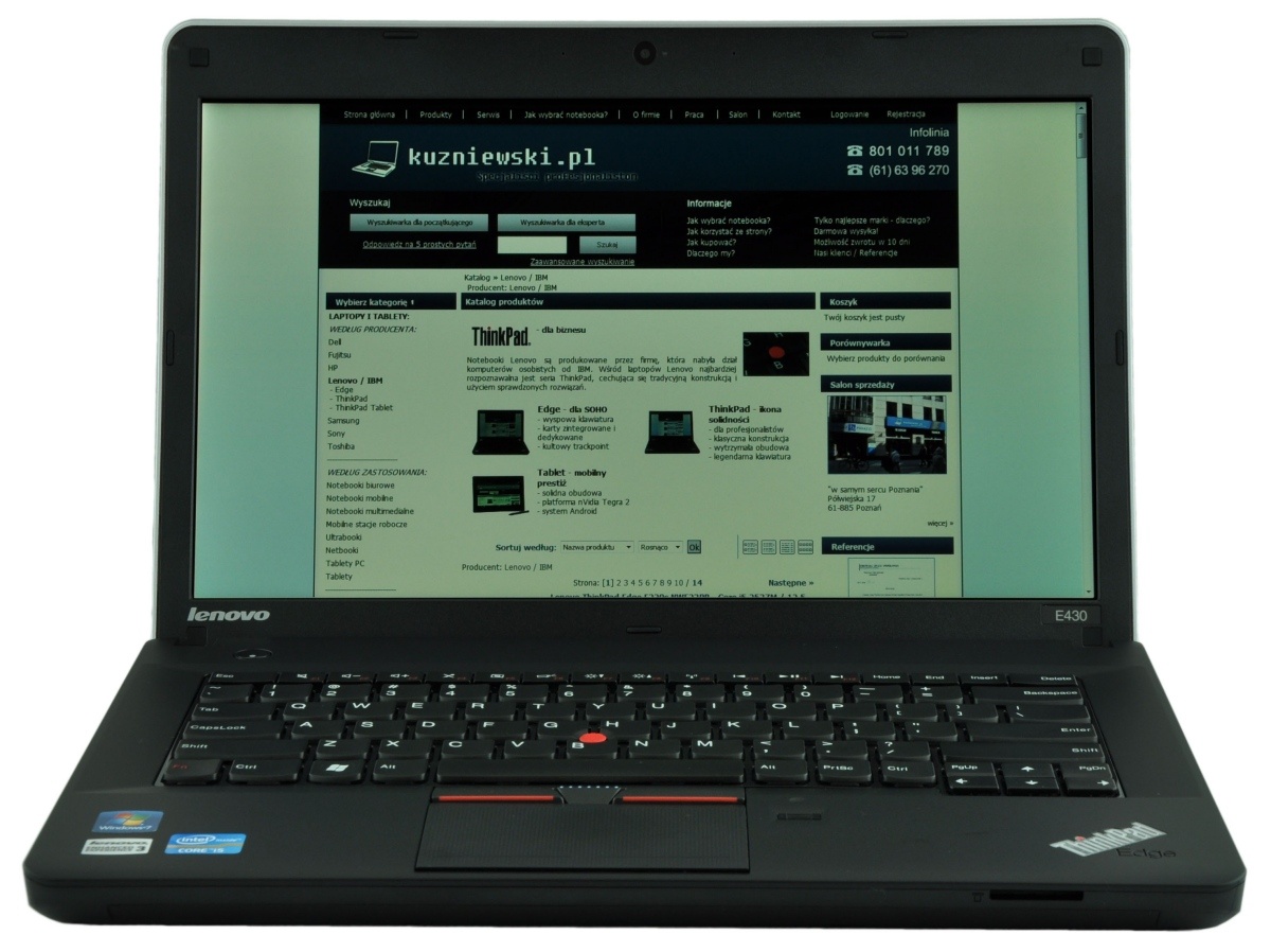 Lenovo ThinkPad laptop open with a Polish website visible on the screen.