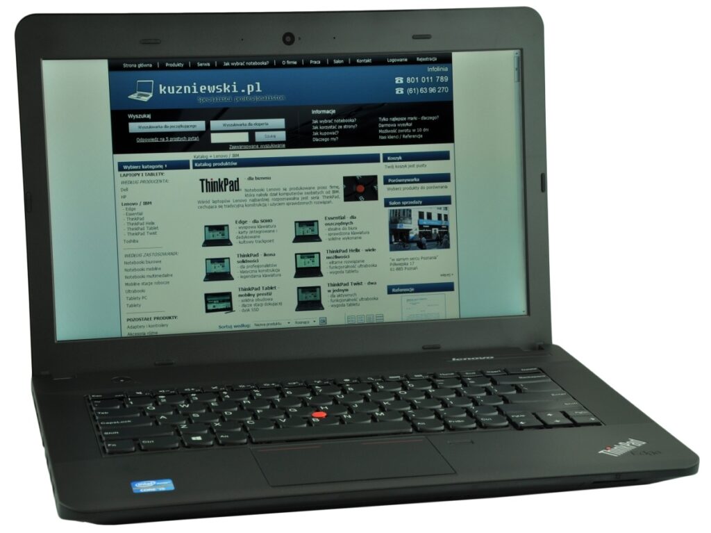 lenovo-thinkpad-edge-e43_122482 - lab-kuzniewski.pl - Testy laptopów, recenzje i porównania Open Lenovo ThinkPad laptop showing kuzniewski.pl website on screen, keyboard visible in the foreground.