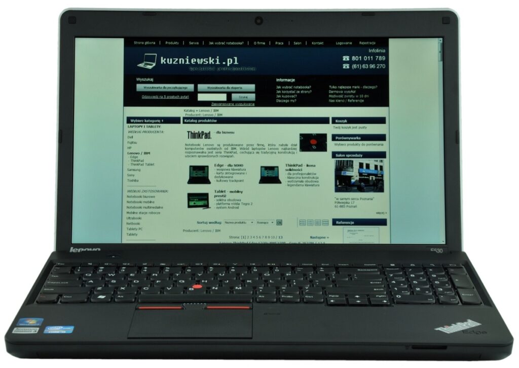 Black Lenovo ThinkPad laptop with red TrackPoint, open to a Polish e-commerce site kuzniewski.pl displayed on the screen.