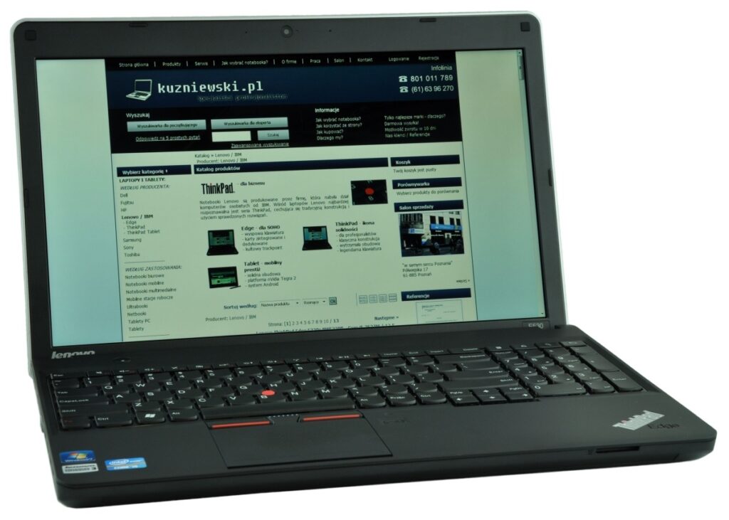 Lenovo ThinkPad laptop open, showing a Polish e-commerce site (kuzniewski.pl) on the screen.