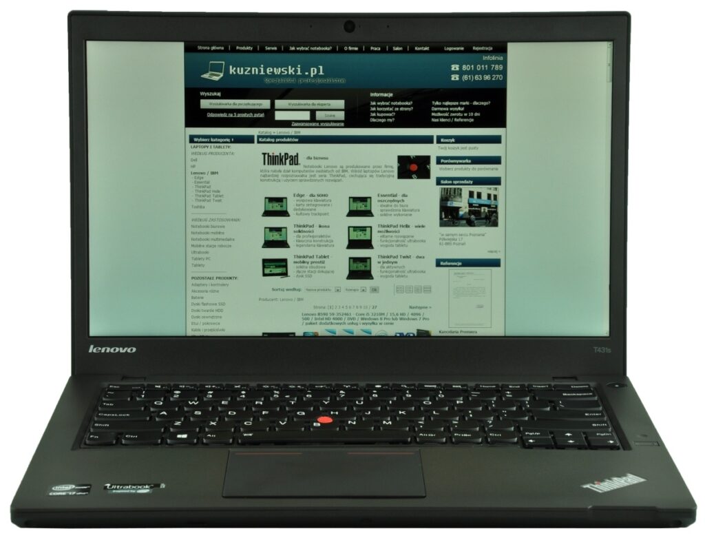 Open Lenovo ThinkPad laptop displaying a Polish e-commerce site with product listings and navigation on the screen.