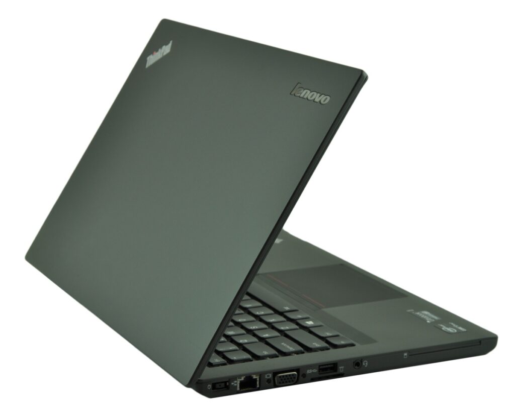 lenovo-thinkpad-t431s-20_122876 - lab-kuzniewski.pl - Testy laptopów, recenzje i porównania Lenovo ThinkPad laptop angled open, showing keyboard and side ports (HDMI, VGA, USB) on a dark chassis