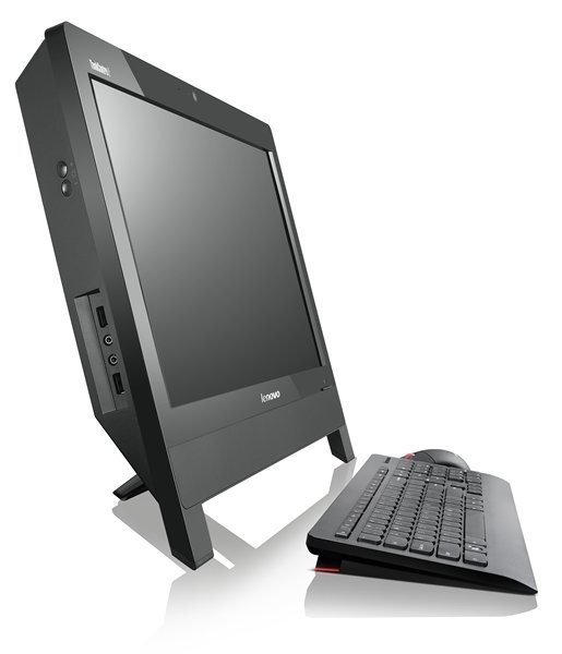 Lenovo all-in-one desktop with a tilted monitor on a stand and a separate keyboard nearby