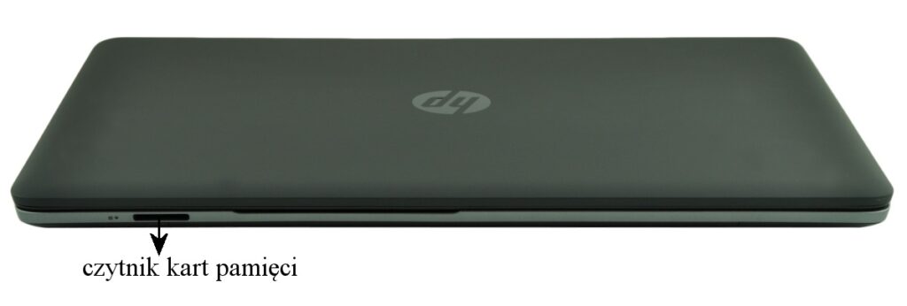 Closed dark gray laptop shown from the side with a memory card reader on the left edge.