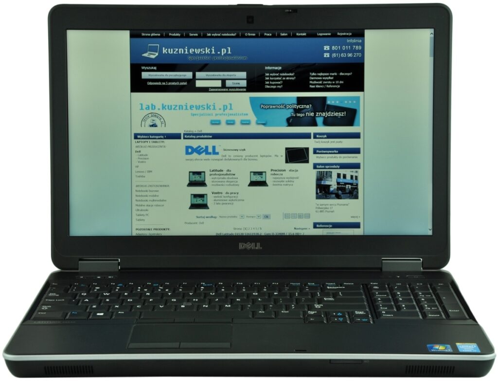dell-latitude-e6540-5197_125176 - lab-kuzniewski.pl - Testy laptopów, recenzje i porównania Open Dell laptop displaying a Polish tech website with a blue header and product grid on the screen.