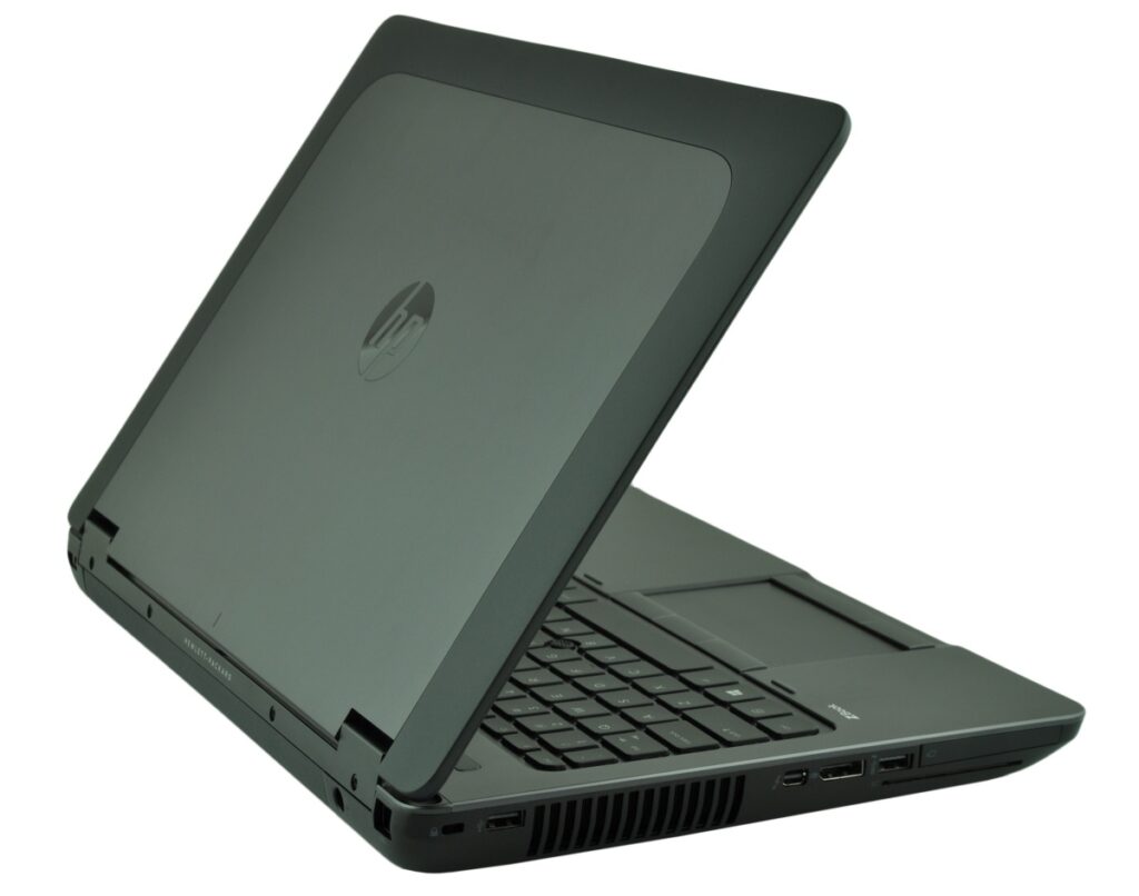 Open HP laptop shown from a side angle, with keyboard visible and screen tilted backward in a matte dark gray chassis.