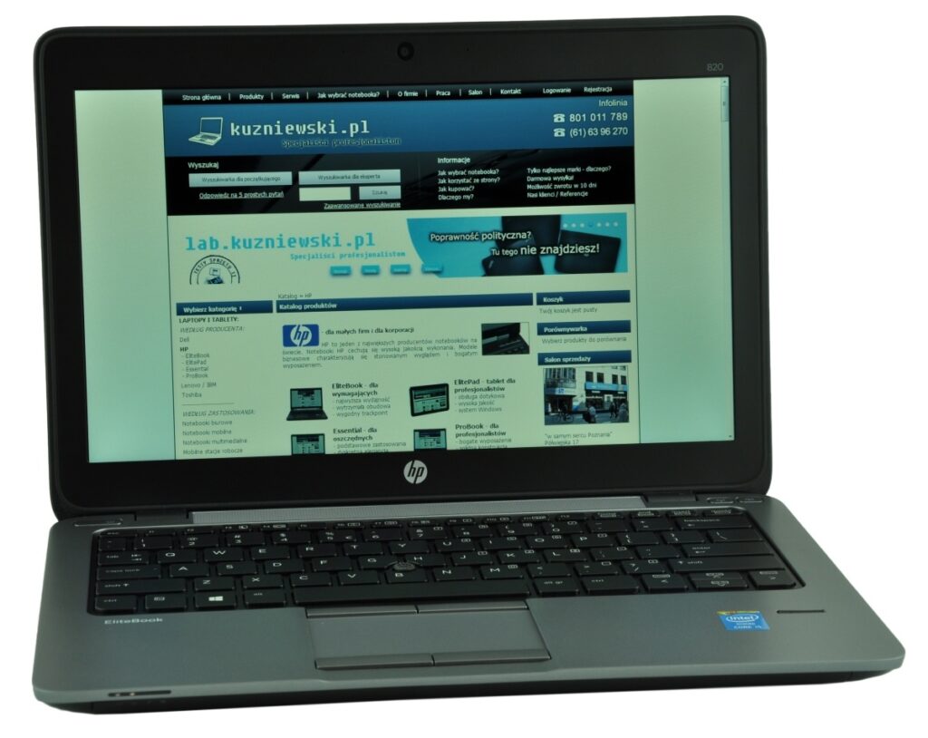 hp-elitebook-820-g1-h5g0_127285 - lab-kuzniewski.pl - Testy laptopów, recenzje i porównania HP EliteBook laptop open, displaying a blue Polish website (kuzniewski.pl) on the screen with a full keyboard visible.