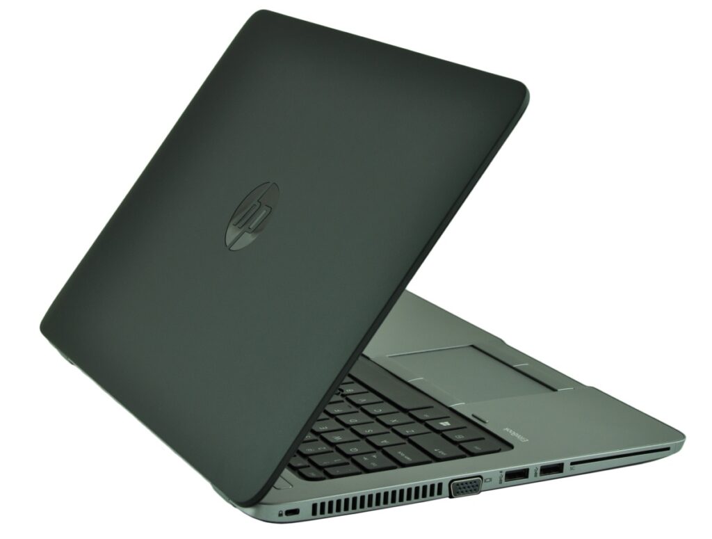 HP laptop with dark green chassis, partially open to reveal keyboard and trackpad area