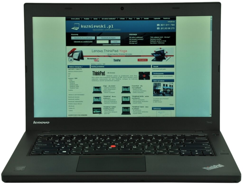 Lenovo ThinkPad laptop open with a website page visible on the screen.