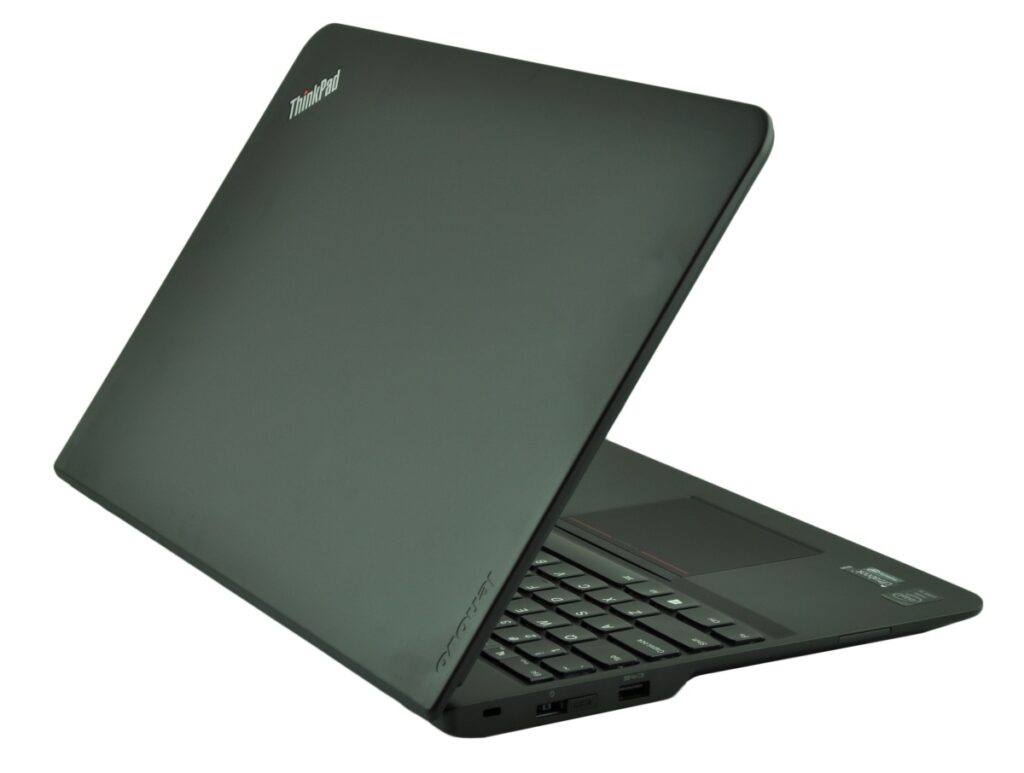 Open ThinkPad laptop viewed from the side with keyboard visible and ThinkPad logo on lid