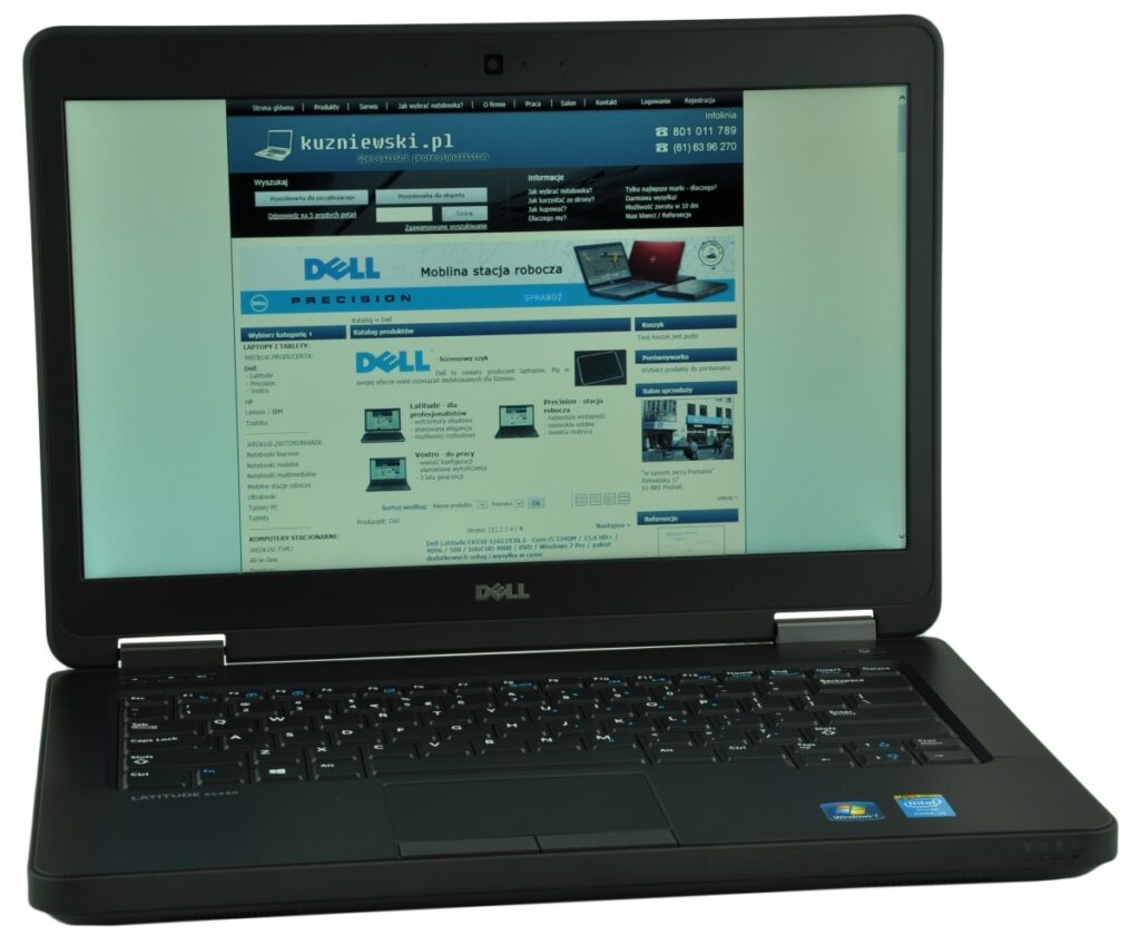 dell-latitude-e5440-5194_125285 - lab-kuzniewski.pl - Testy laptopów, recenzje i porównania Open Dell Latitude laptop displaying a blue-themed website on screen, keyboard visible and Dell logo on bezel
