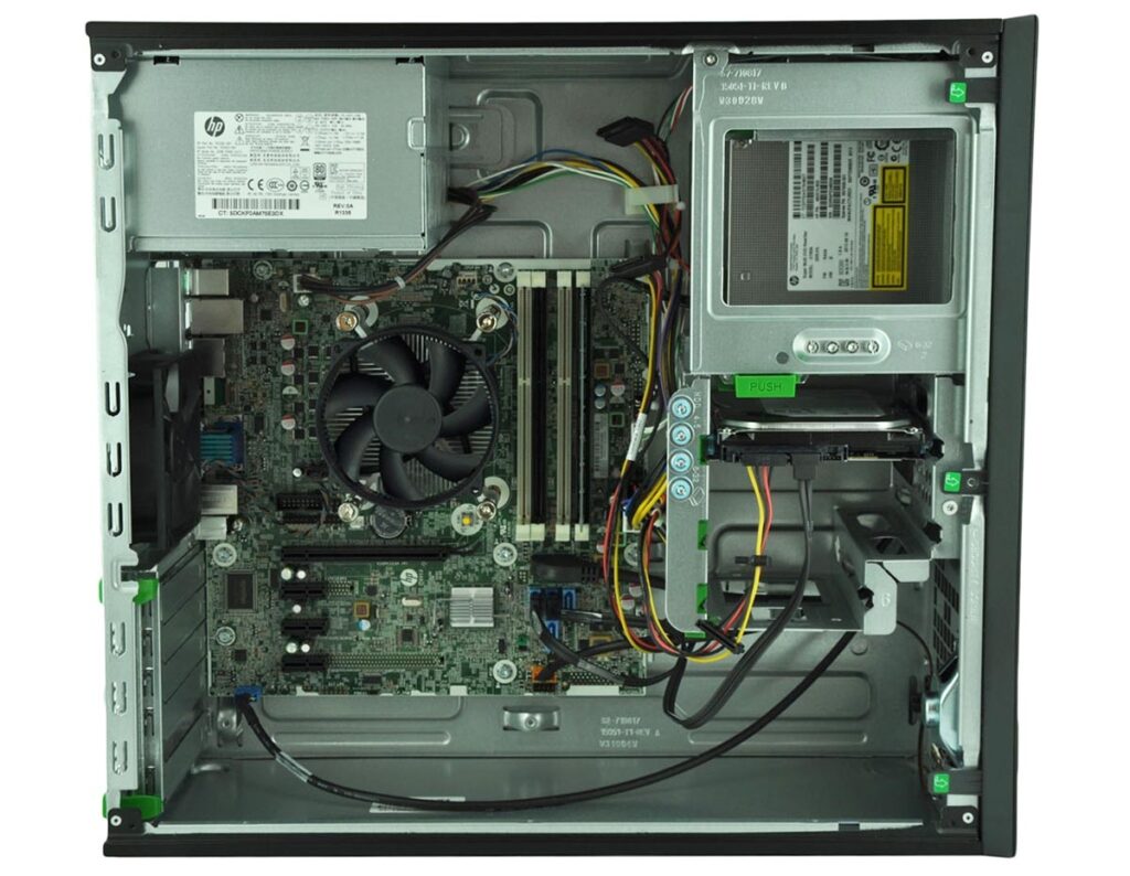 Interior of a server/computer chassis showing a motherboard, CPU cooling fan, RAM slots, power supply, and neatly routed cables