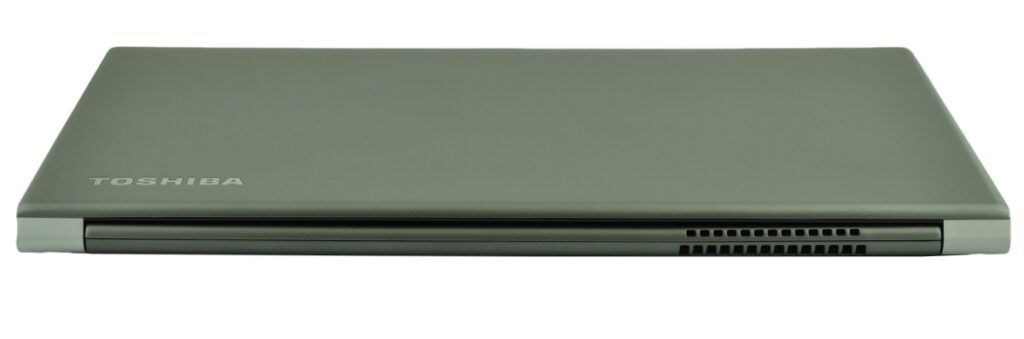 Closed Toshiba laptop viewed from the side, showing the ventilation grill along the edge and branding on the lid.