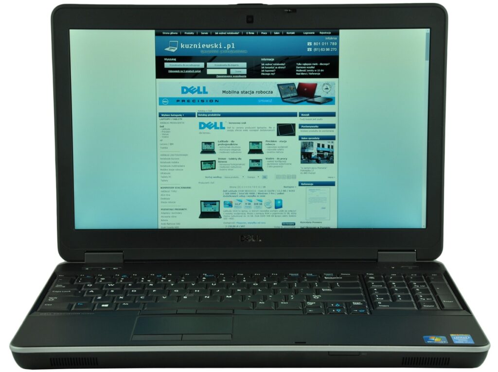 Open Dell laptop displaying a blue-and-white website on its screen, with a teal gradient background behind it.