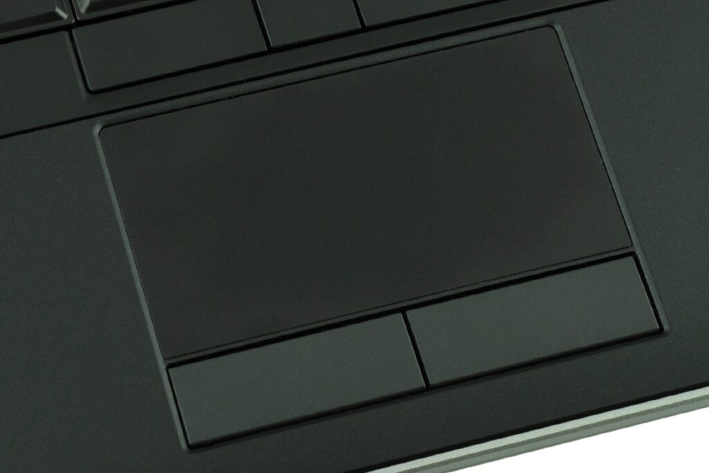 Close-up of a black laptop trackpad with two rectangular buttons below it.