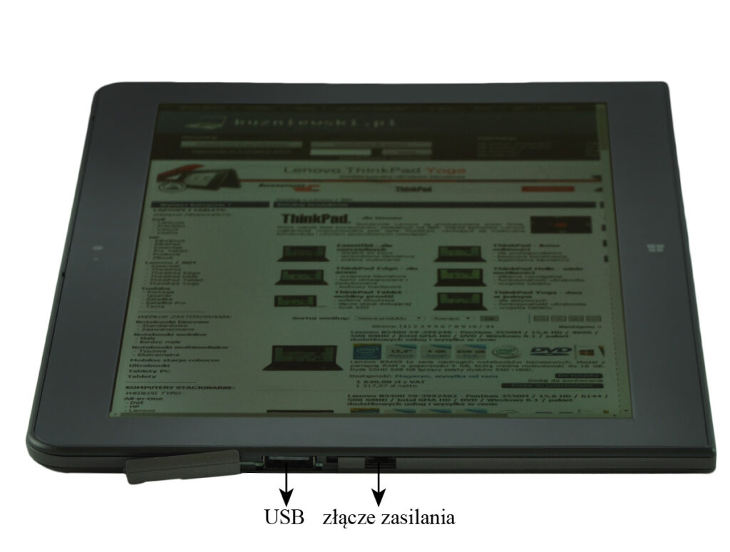 Tablet computer with a screen displaying a website; two ports at the bottom labeled USB and power connector visible.