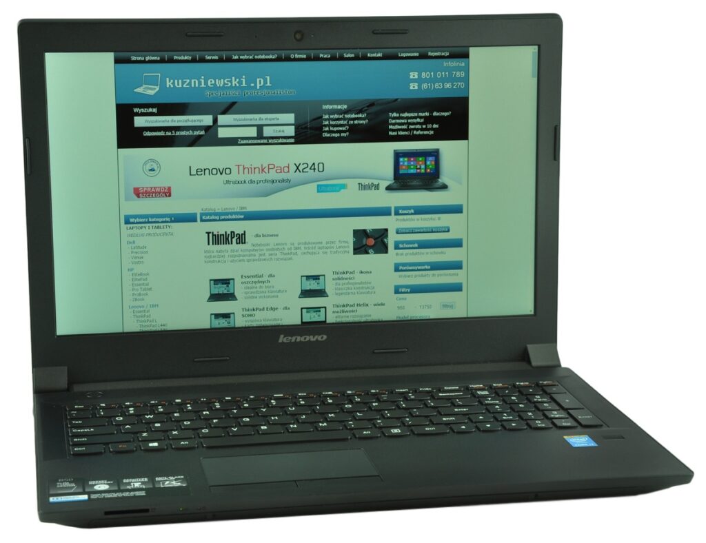 Open Lenovo ThinkPad X240 laptop displaying a Polish tech website on its screen.