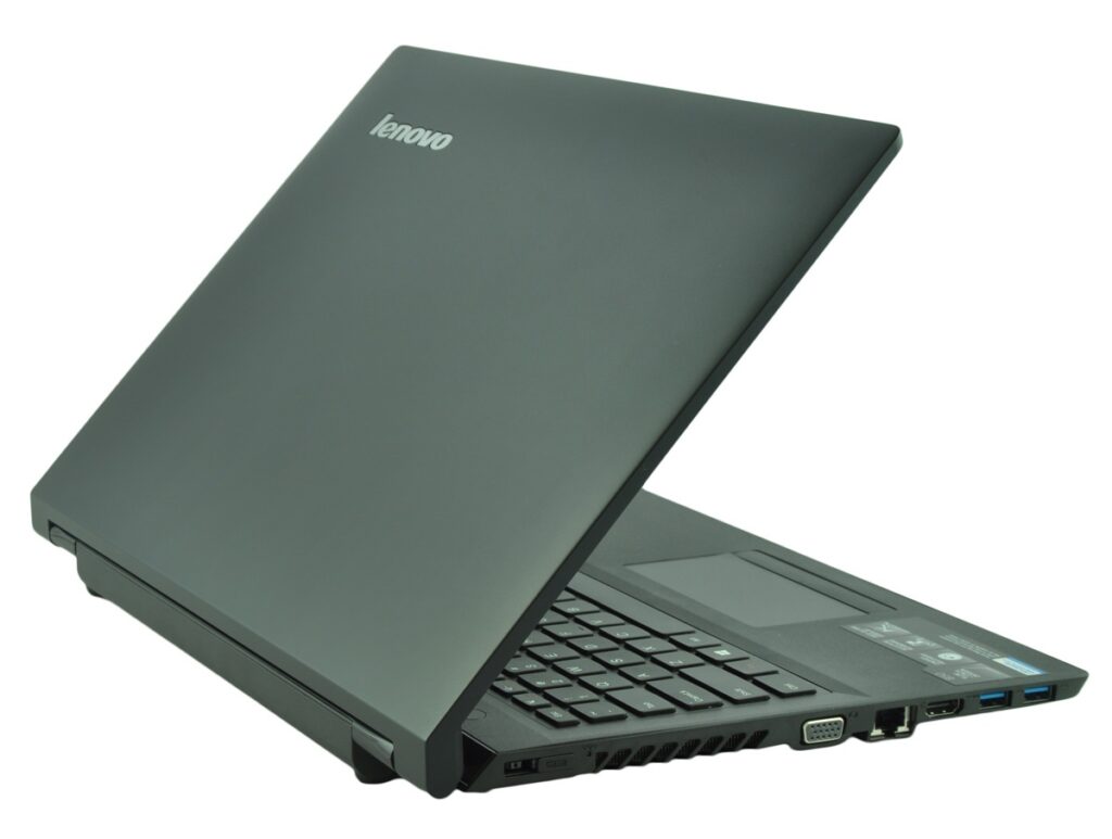 Lenovo laptop partially open, angled to the right, showing the keyboard and side ports on a dark gray chassis.