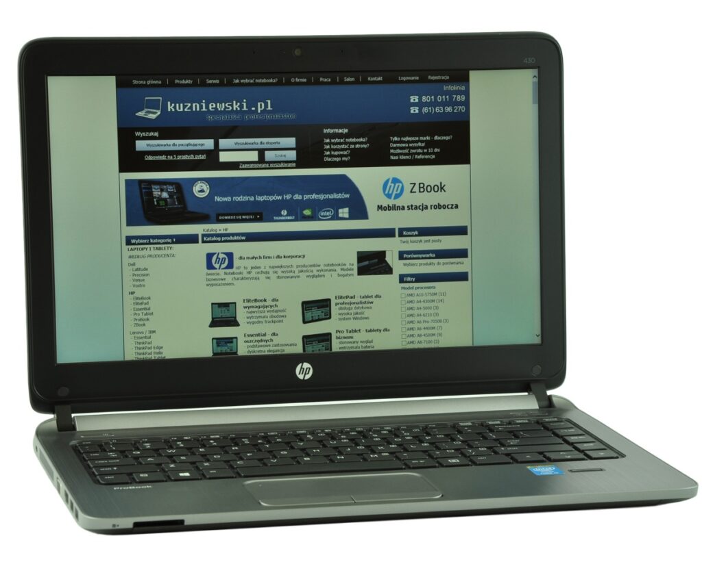 hp-probook-430-g2-g6w25e_129668 - lab-kuzniewski.pl - Testy laptopów, recenzje i porównania Open HP laptop showing a website on its screen with a blue header and navigation bar.
