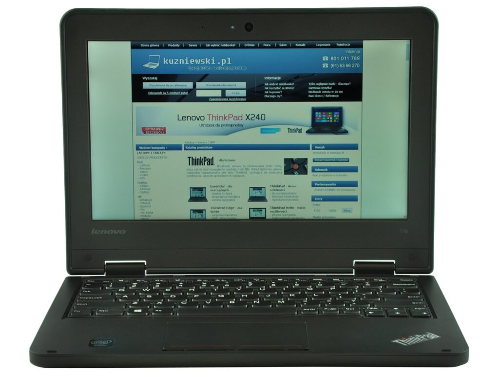 Open black Lenovo ThinkPad laptop displaying a blue-tinged website on its screen, keyboard in view.