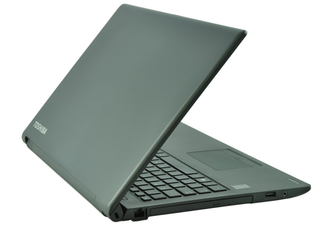 Toshiba laptop open at a 45-degree angle, showing keyboard and touchpad as viewed from the side.