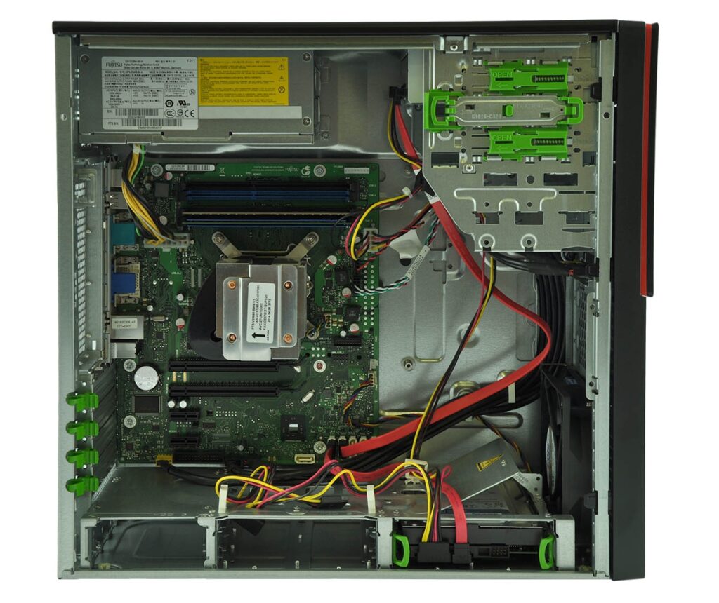 Open computer chassis showing motherboard, RAM, CPU cooler, power supply, and cables inside a server-style PC