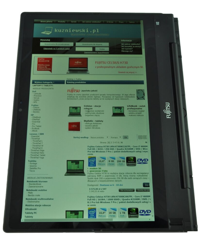 fujitsu-lifebook-t904-lk_130541 - lab-kuzniewski.pl - Testy laptopów, recenzje i porównania Tablet device displaying a Fujitsu product catalog webpage with a green header and multiple product sections on the screen.