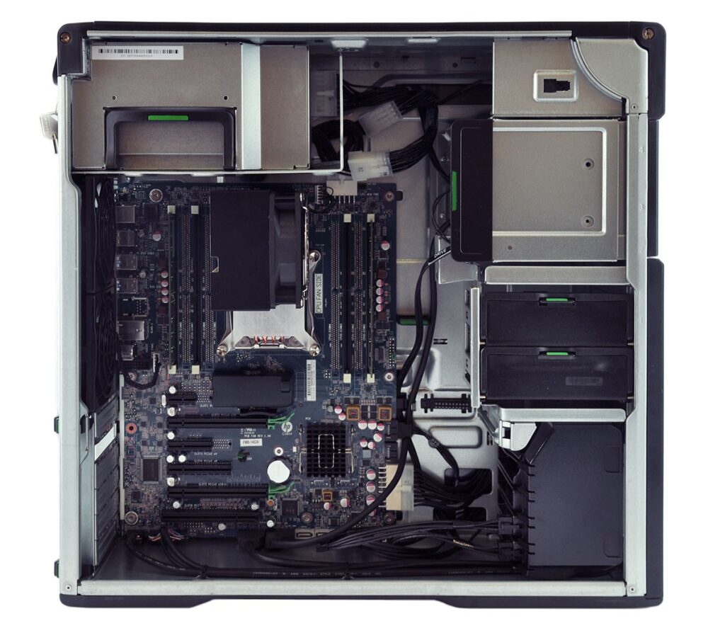Internal view of a desktop computer case showing the motherboard, expansion slots, power supply, and drive bays.
