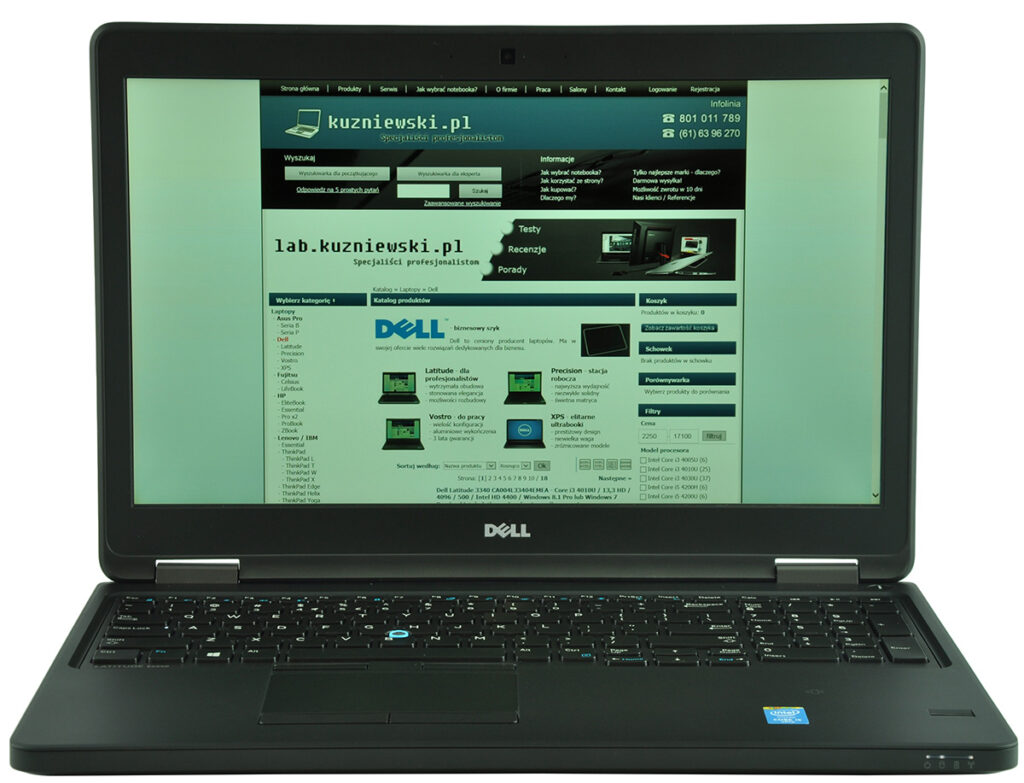 Dell laptop open to a Polish tech site with a teal header and laptop images on the screen