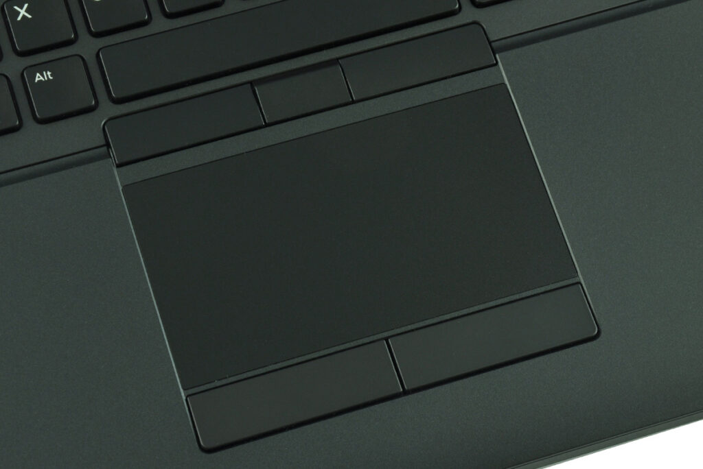 Close-up of a laptop touchpad with left/right mouse buttons and dark palm rest area