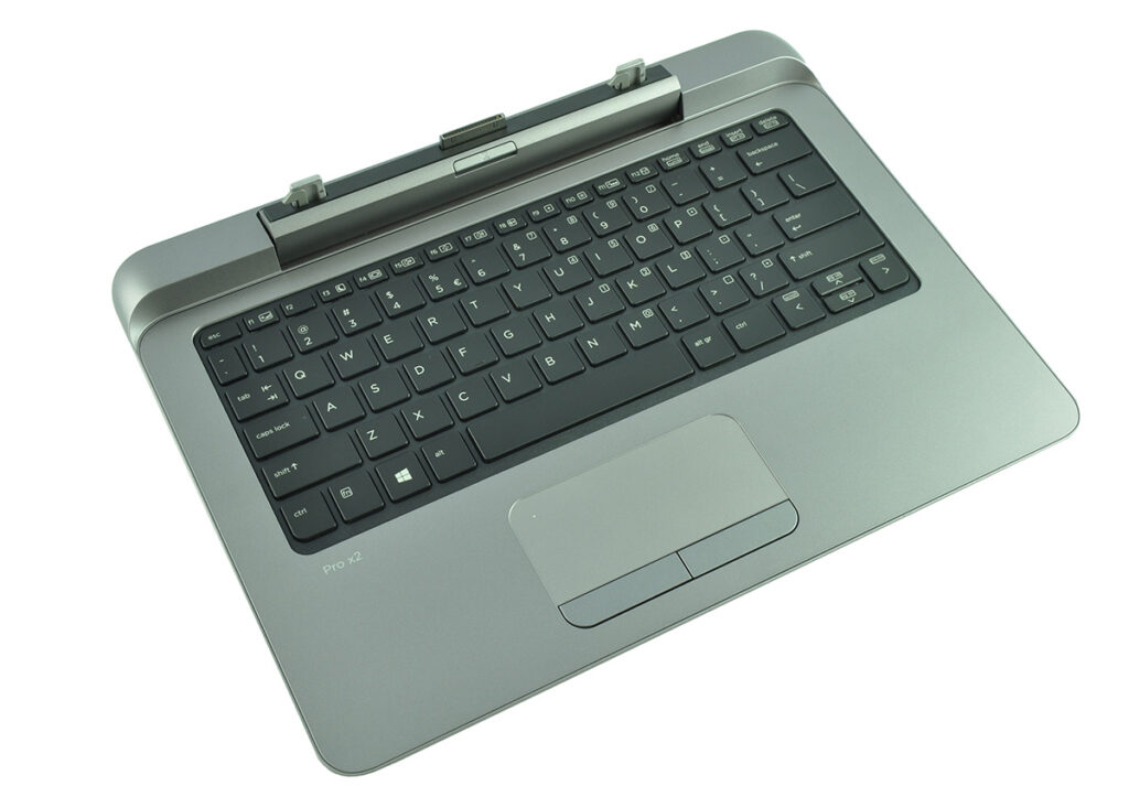 laptop-hp-probook-x2-612-11 - lab-kuzniewski.pl - Testy laptopów, recenzje i porównania Top-down view of a silver laptop keyboard with a touchpad and palm rest, labeled Pro X2, angled to show the keyboard layout.