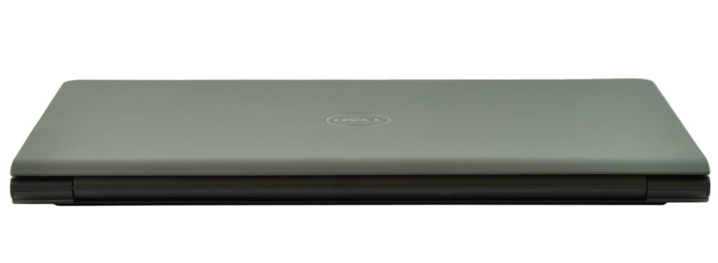 Closed gray Dell laptop viewed from the side showing a slim profile and a centered Dell logo on the lid