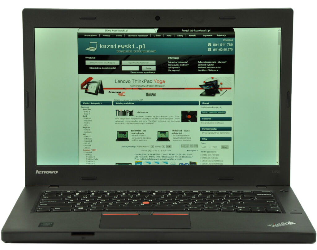 laptop-lenovo-thinkpad-l450-1 - lab-kuzniewski.pl - Testy laptopów, recenzje i porównania Lenovo ThinkPad laptop with a green-tinted website displayed on the screen; keyboard and touchpad visible.