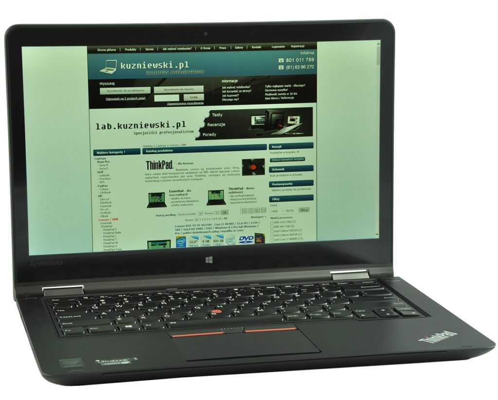 lenovo-thinkpad-yoga-14_131821 - lab-kuzniewski.pl - Testy laptopów, recenzje i porównania Black Lenovo ThinkPad laptop open, showing the kuzniowski.pl homepage on the screen