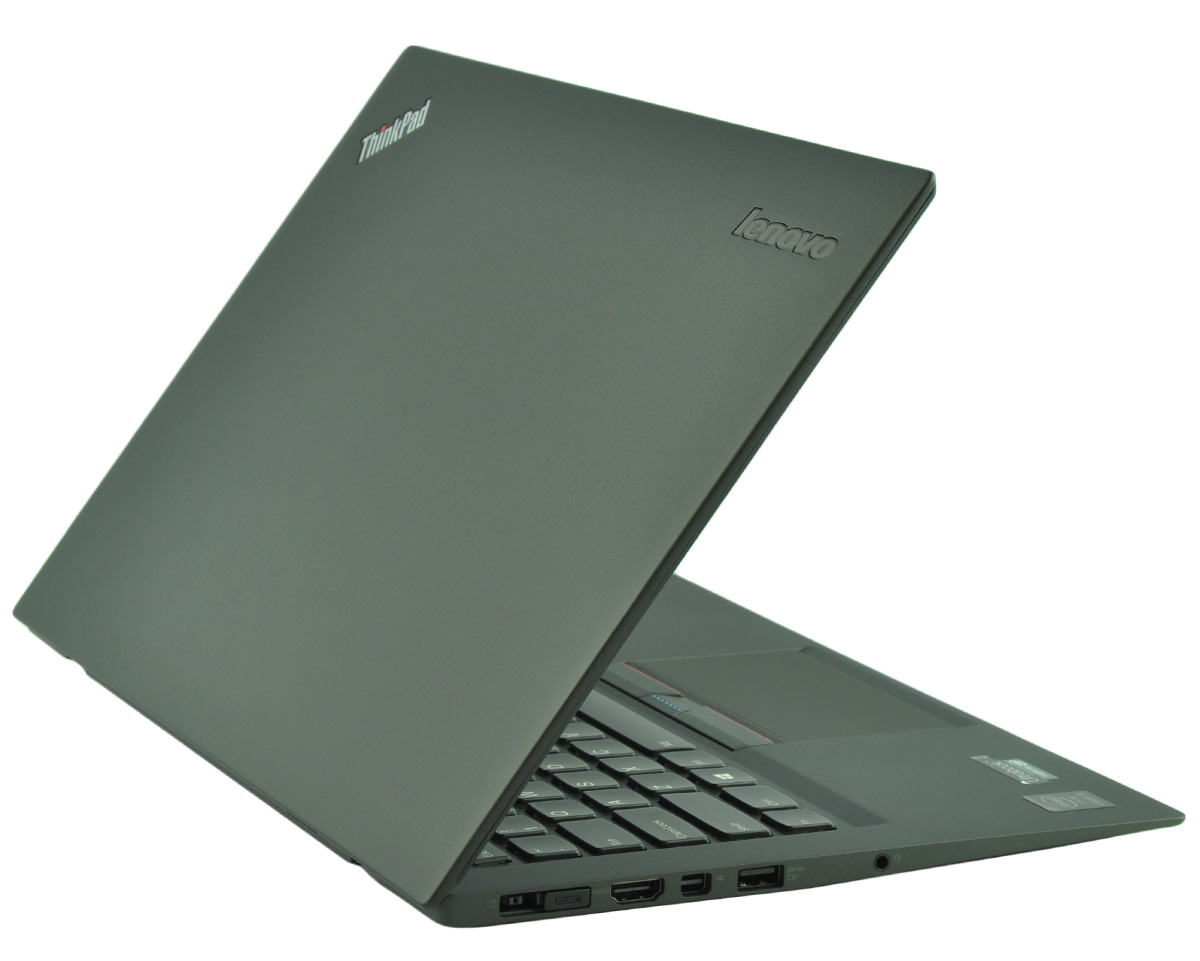 laptop-lenovo-thinkpad-x1-carbon3-4 - lab-kuzniewski.pl - Testy laptopów, recenzje i porównania Dark gray Lenovo ThinkPad laptop opened at an angle, keyboard visible with ports along the side and ThinkPad logo on the lid