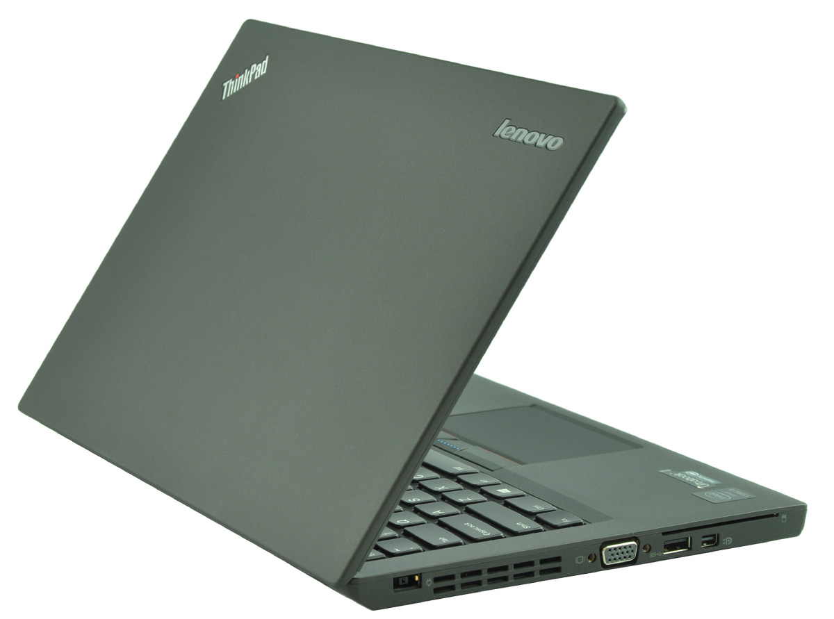laptop-lenovo-thinkpad-x250-4 - lab-kuzniewski.pl - Testy laptopów, recenzje i porównania Lenovo ThinkPad laptop partially open, showing side ports like VGA, USB, and vents from a diagonal angle